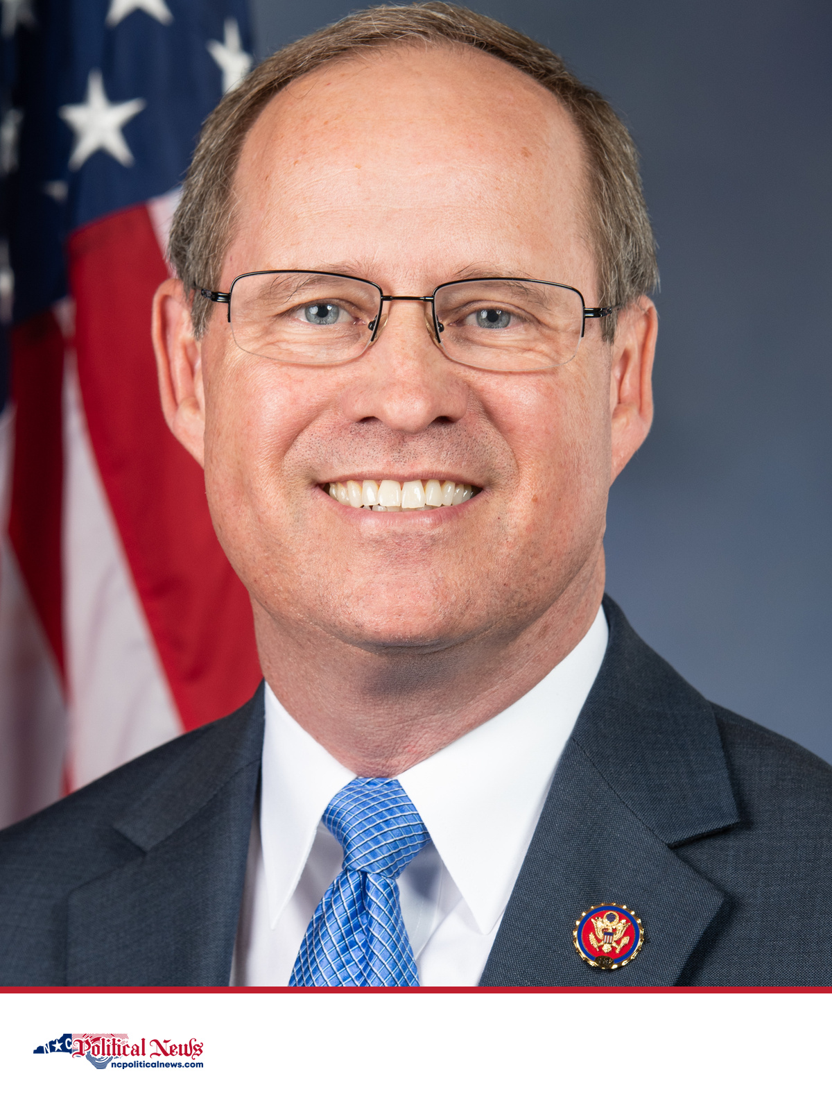 Official portrait of U.S. Rep. Greg Murphy in front of a U.S. flag.