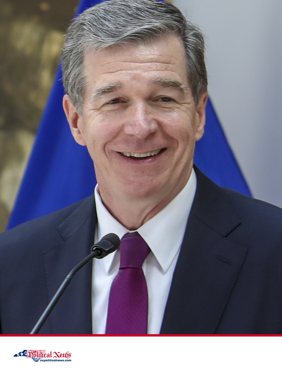Roy Cooper speaks at a July 2019 bill-signing ceremony at North Carolina National Guard headquarters in Raleigh.