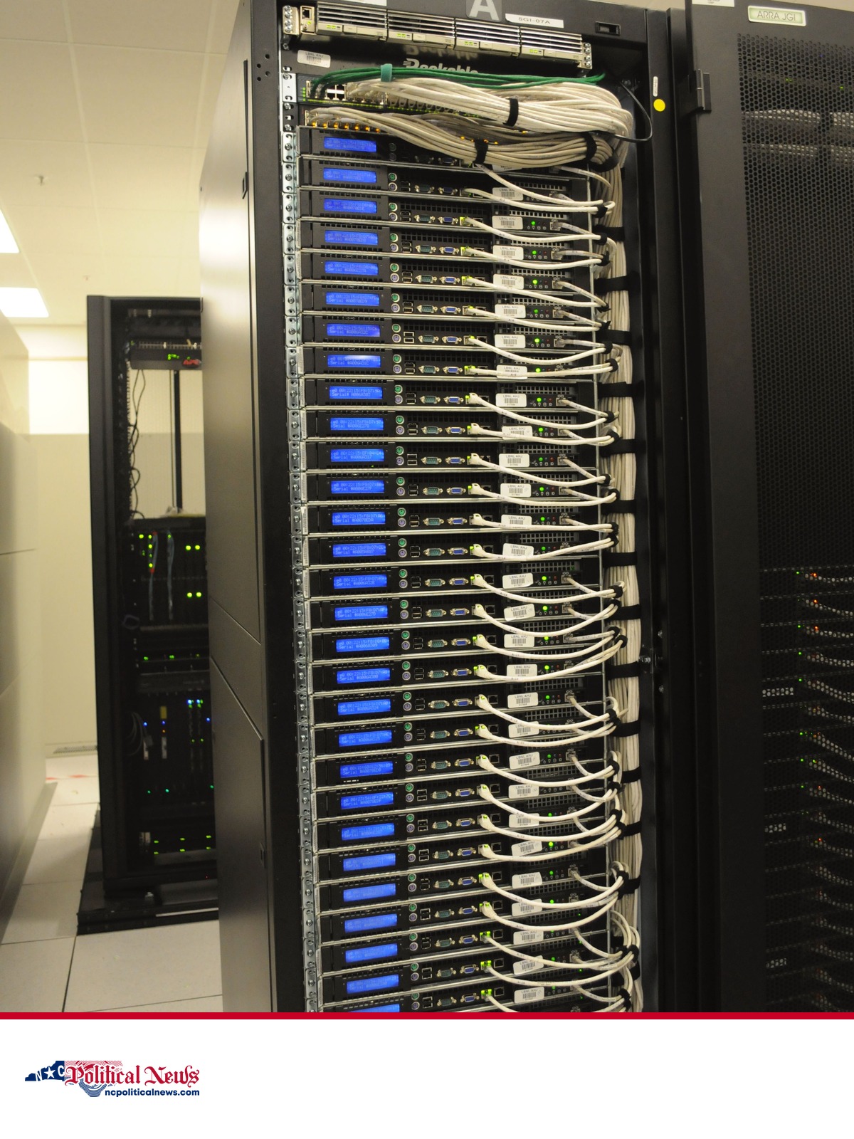 File photo of server racks inside a data center above the NC Political News footer.
