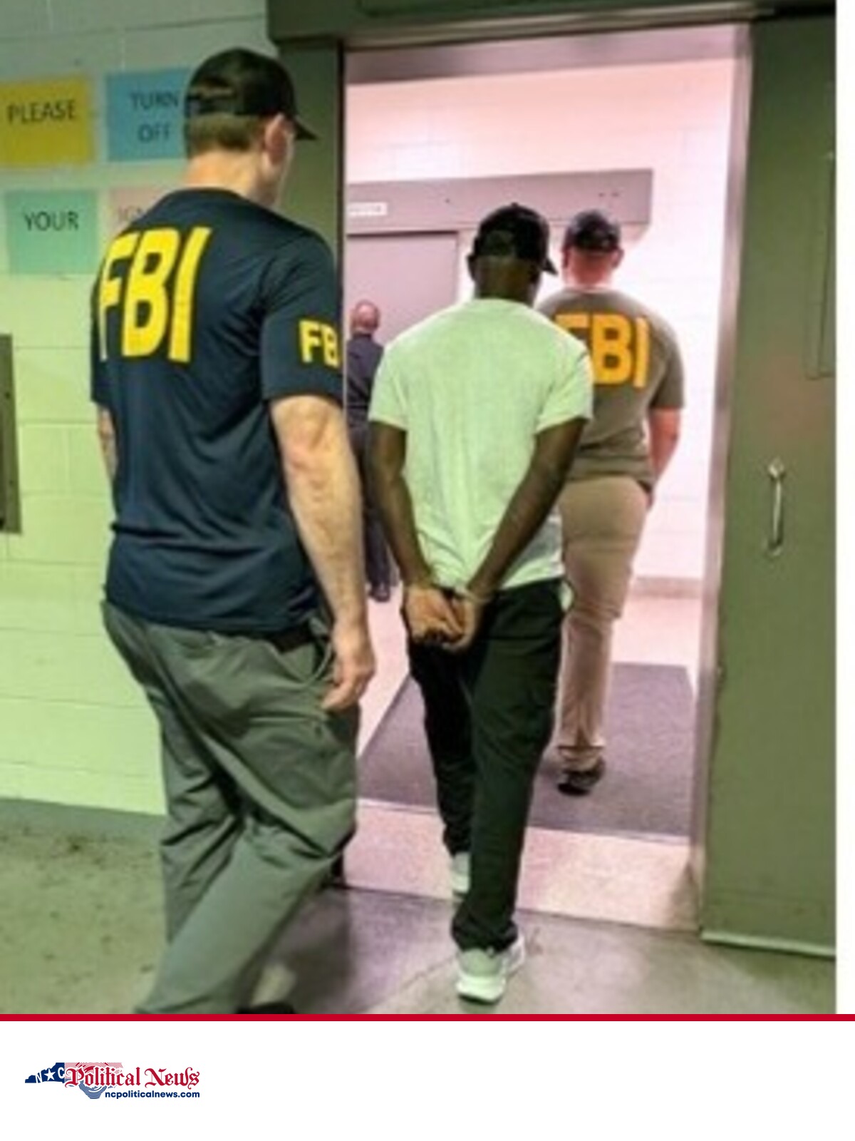 FBI agents escort an arrested individual after federal voting-related indictments in North Carolina; the individual’s face is not shown.
