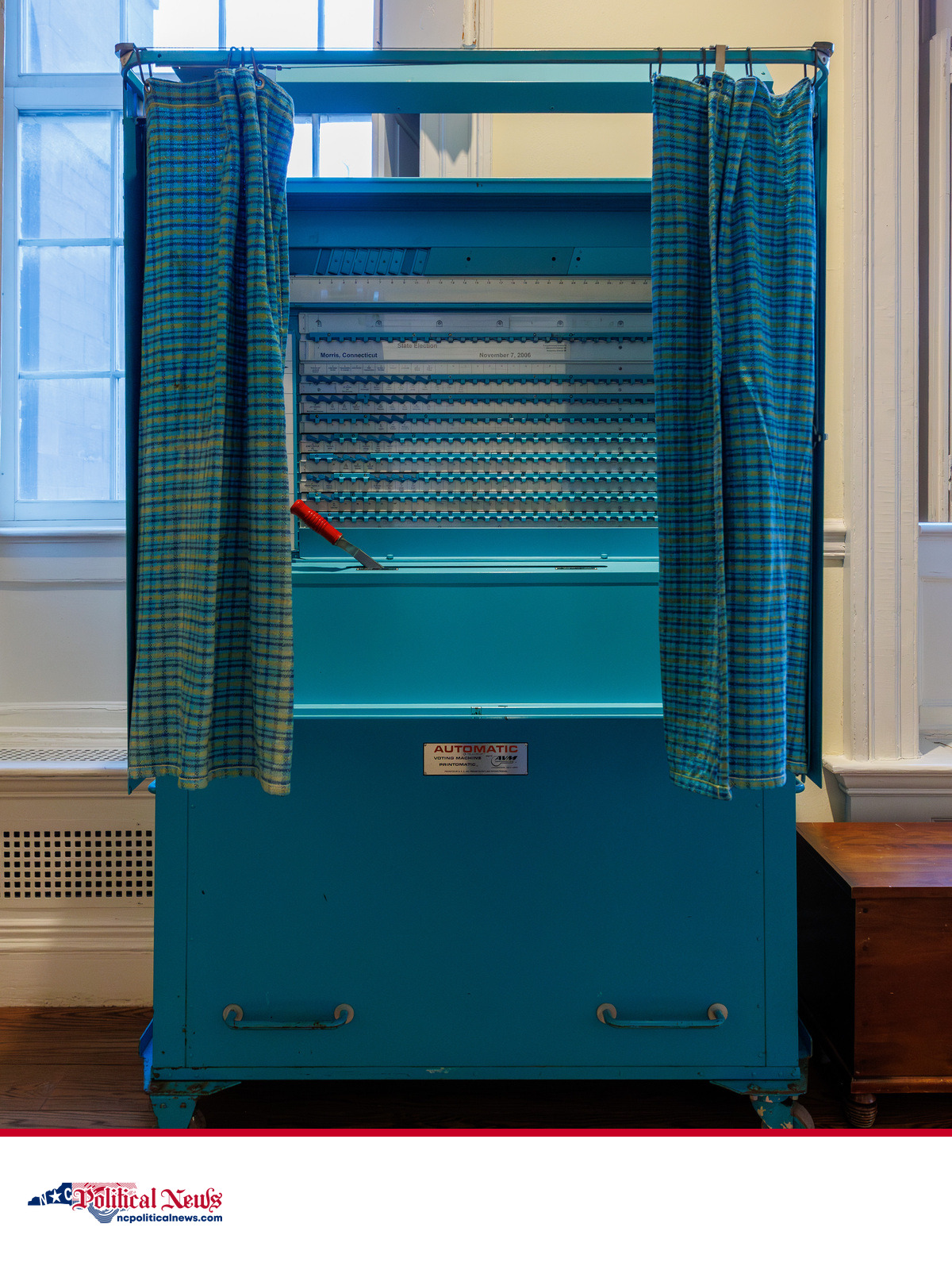 Voting booth used as contextual file imagery for a North Carolina election-administration story.