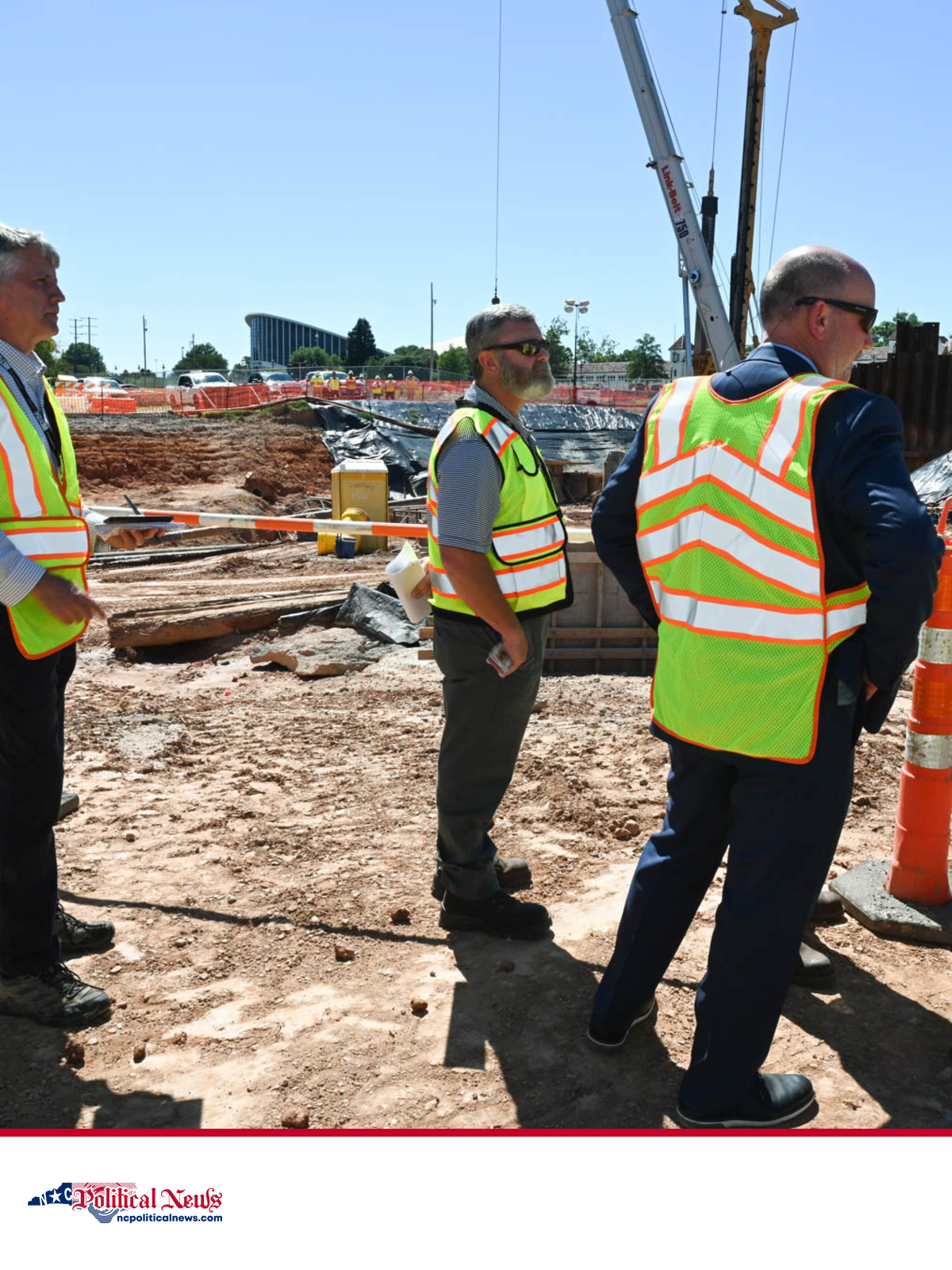 NCDOT officials and project staff stand at the Blue Ridge Road construction site in Raleigh in July 2024.
