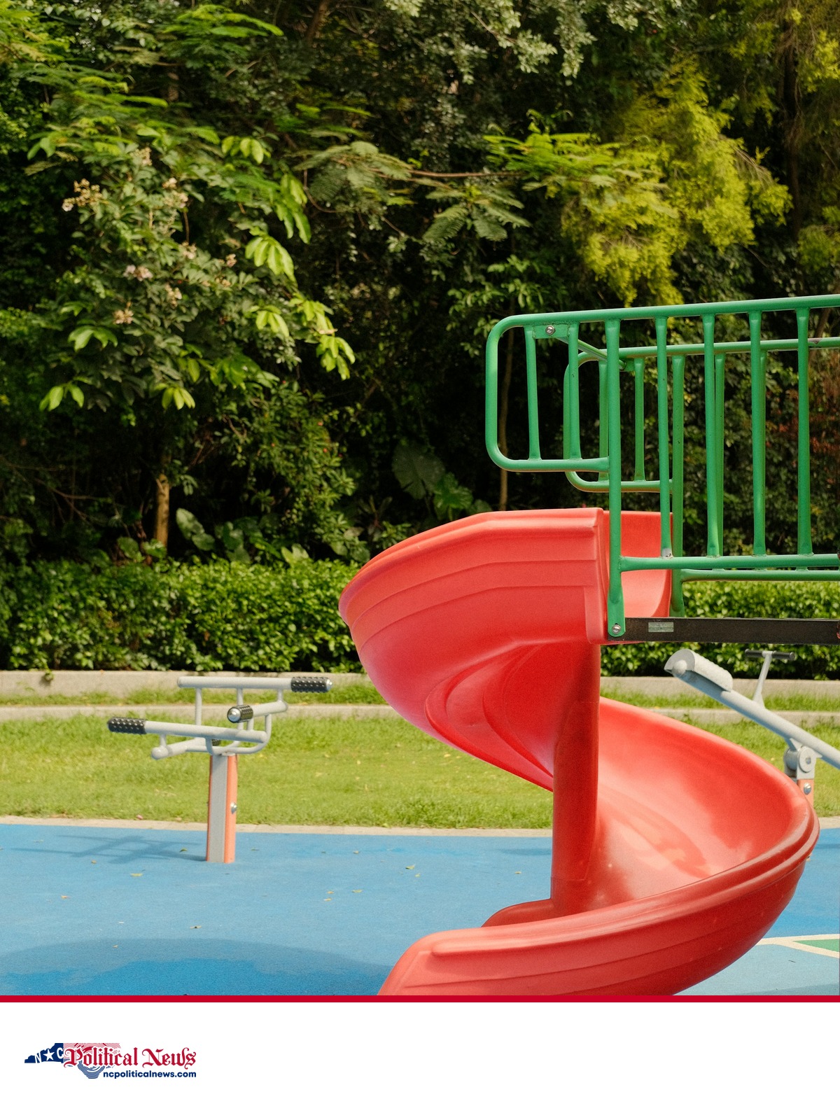A red playground slide and green climbing rails in a public park, shown as contextual imagery.