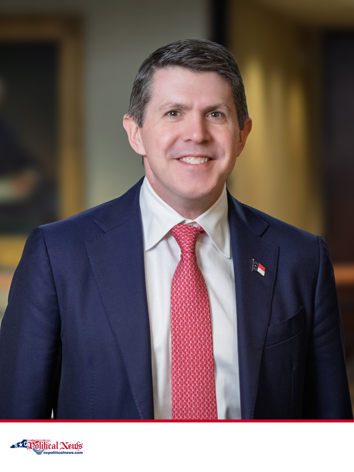 Official portrait of North Carolina Treasurer Brad Briner in his office.
